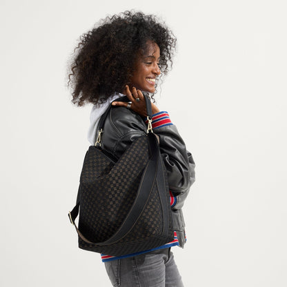 hover | The Bucket Bag in Night Song shown on model.