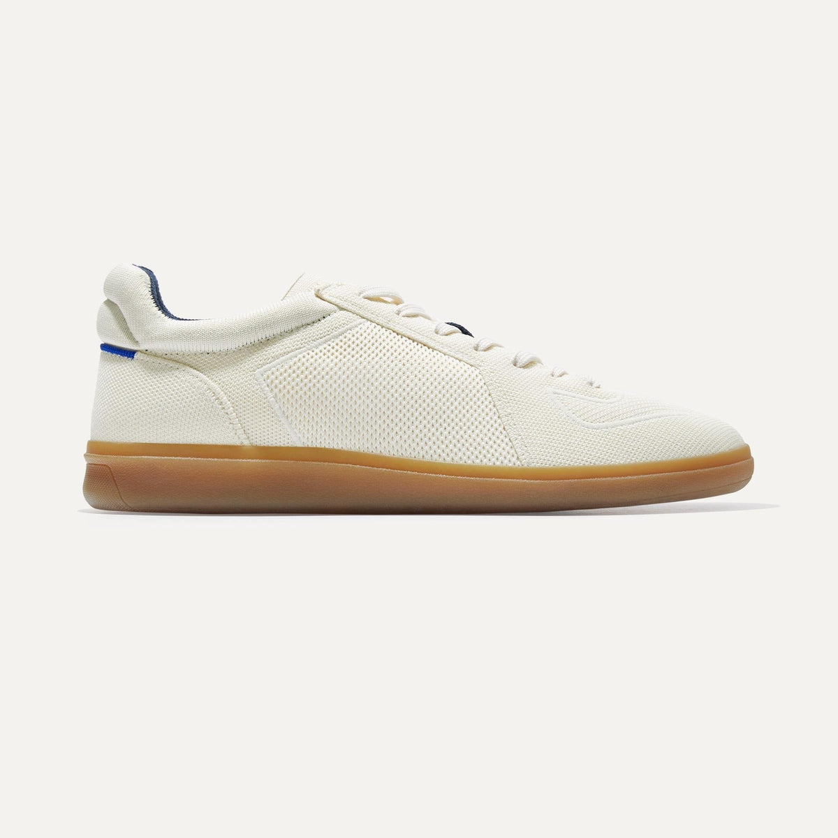 side | The RS01 Sneaker in Bone shown from the side.