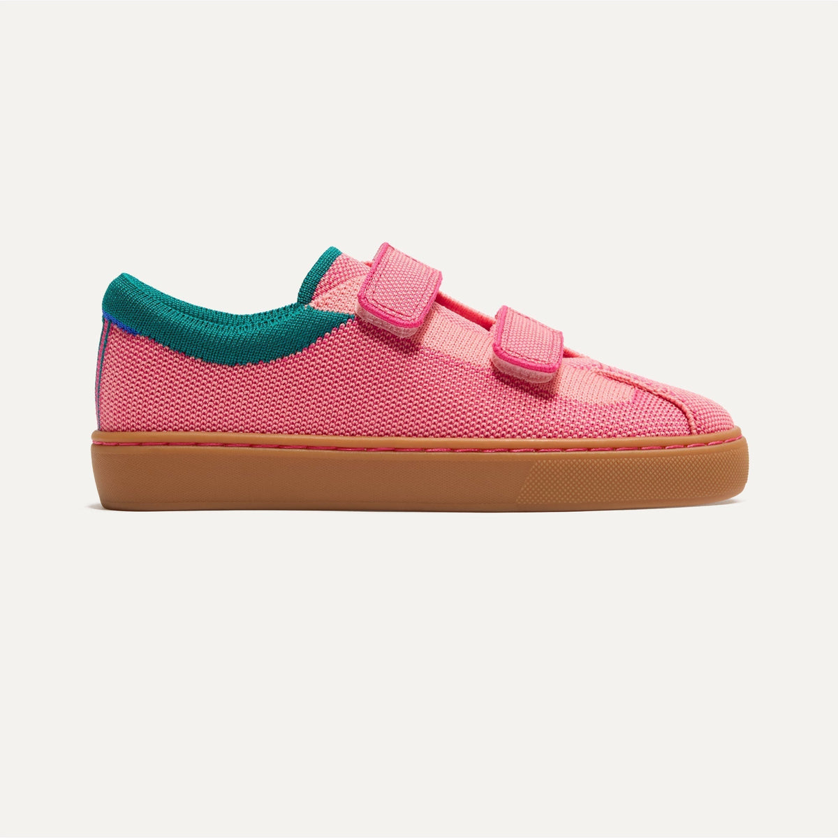 side | The Kids Strap Sneaker in Watermelon shown from the side.