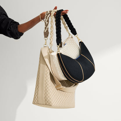 The Shoulder Strap paired with The Crescent Bag, The Daily Crossbody and The Bucket Bag.