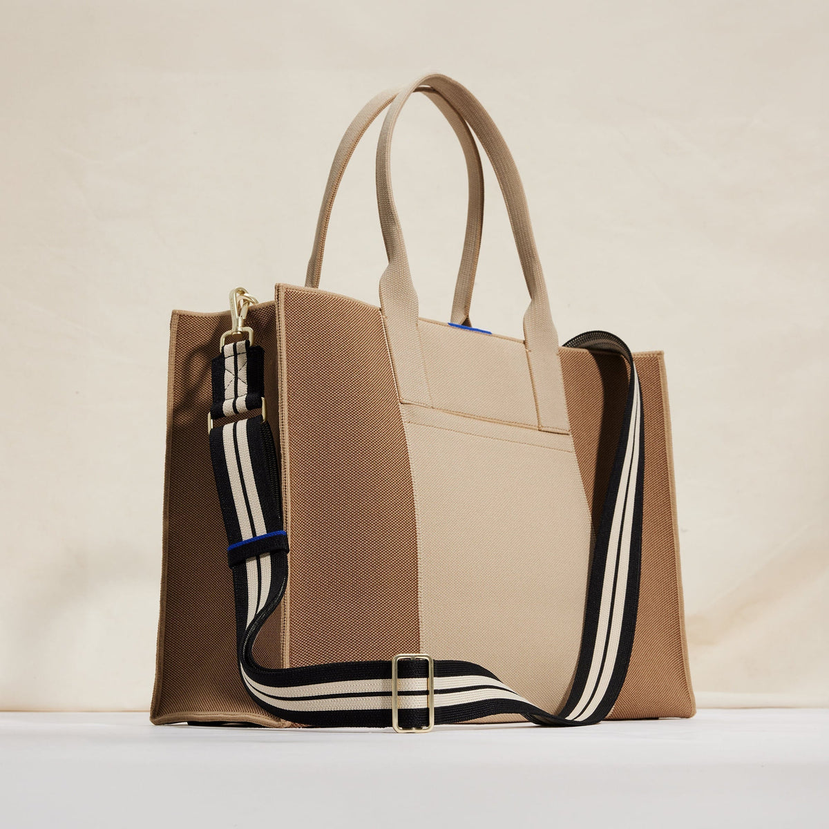 The Crossbody Strap in Black and White Stripe shown paired with The Classic Tote.