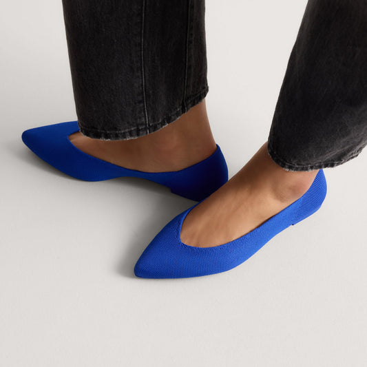 hover | Model wearing The Point III in Rothy's Blue.