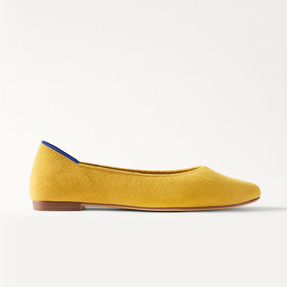 side | The Point III in ReVelvet Saffron shown from the side.