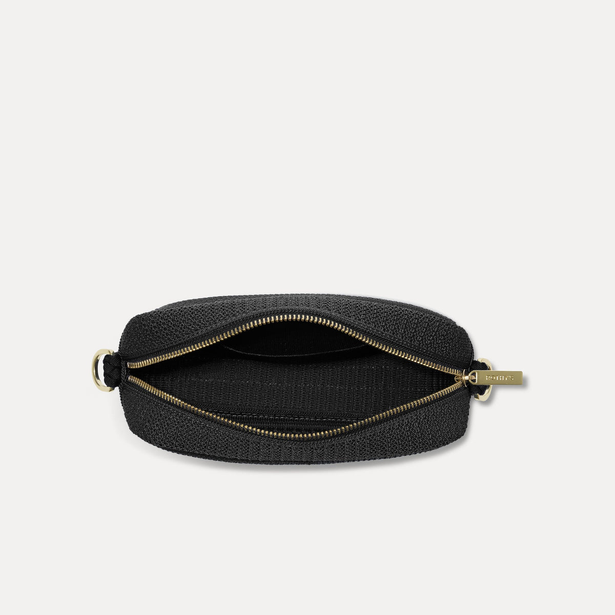 The Crossbody Camera Bag in Black Licorice Open-Knit, shown from above, with the interior exposed.