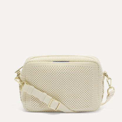 PDP |The Crossbody Camera Bag in Cream Twist Open-Knit, shown from the front.