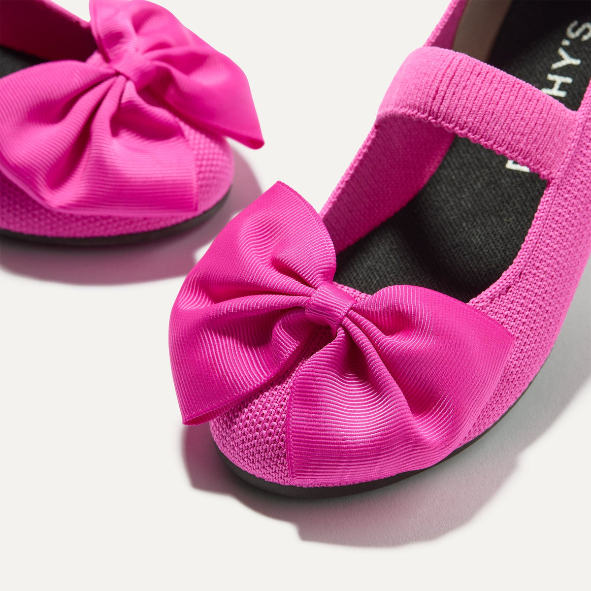 Close up of the bow detail of The Kids Big Bow Mary Jane in Dragon Fruit.
