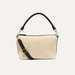 PLP |The Daily Crossbody Bag in Black and White Raffia-Knit shown from the front.