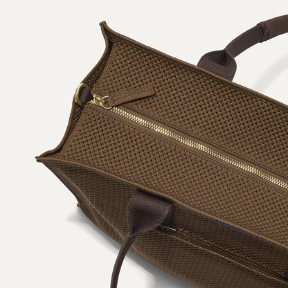 The Classic Tote in Cinnamon Open Knit, shown from above, with the top zipper closed.