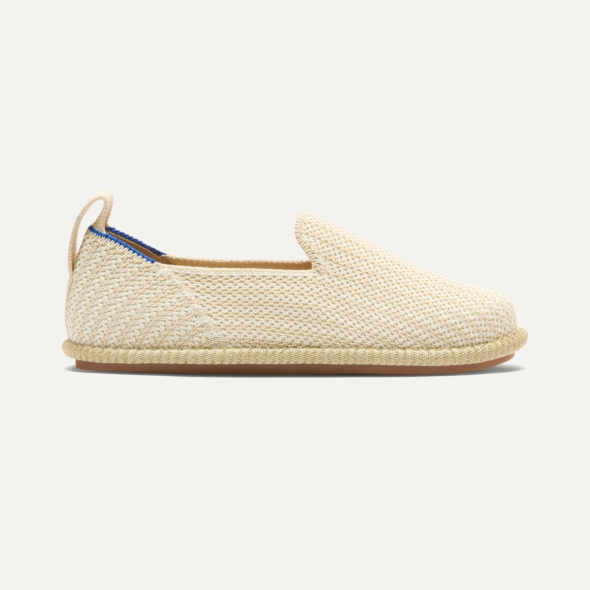 side | The Mini Loafer in Cream Puff Stripe shown from a side view showing the outsole.
