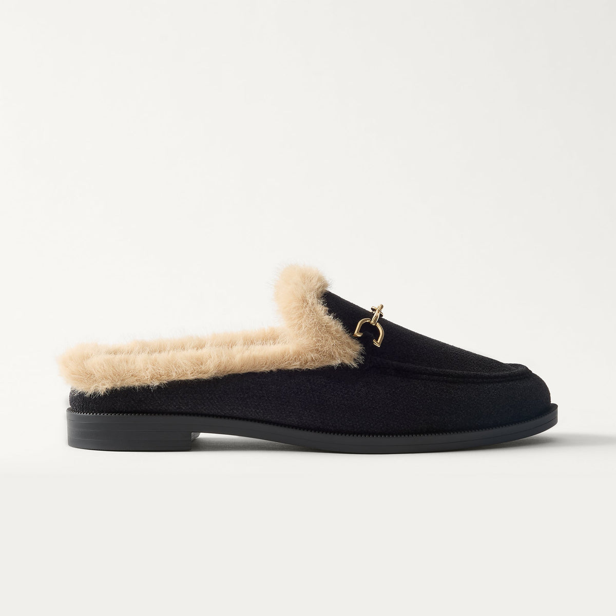 side | The Après Loafer Mule in ReVelvet Black shown from the side.