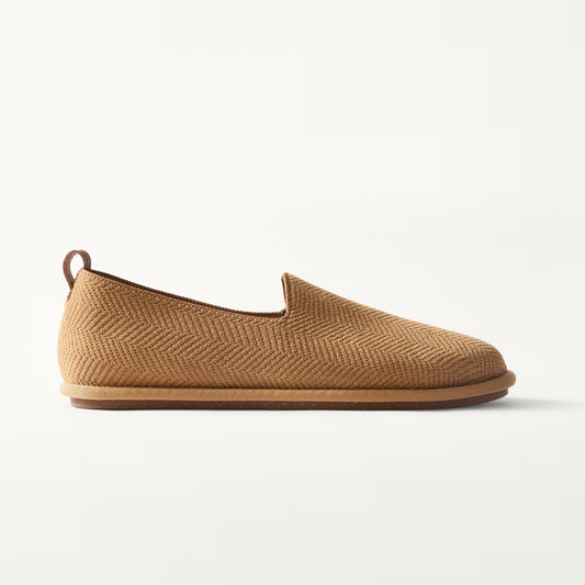 The Men's Cruiser Loafer in ReVelvet™ Pecan Herringbone shown from the side.