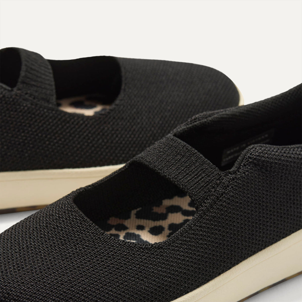 Close up of the strap detail of The Kids MJ Sneaker in Black.