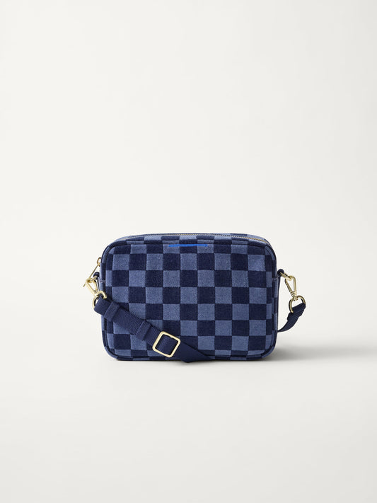 PLP | The Crossbody Camera Bag in ReVelvet™ Blue Ink, shown from the front.